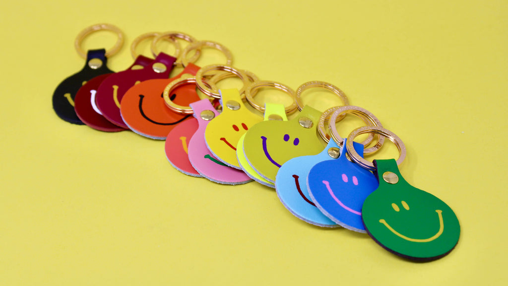 Schlüsselanhänger "Smilie Face" Koralle